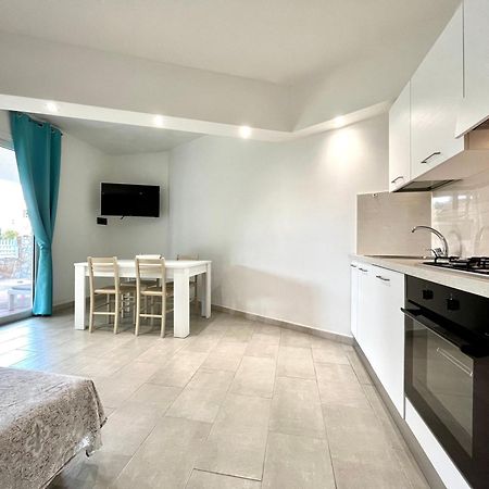 Angolo Mare Apartments & Rooms Porto Pino Exterior photo